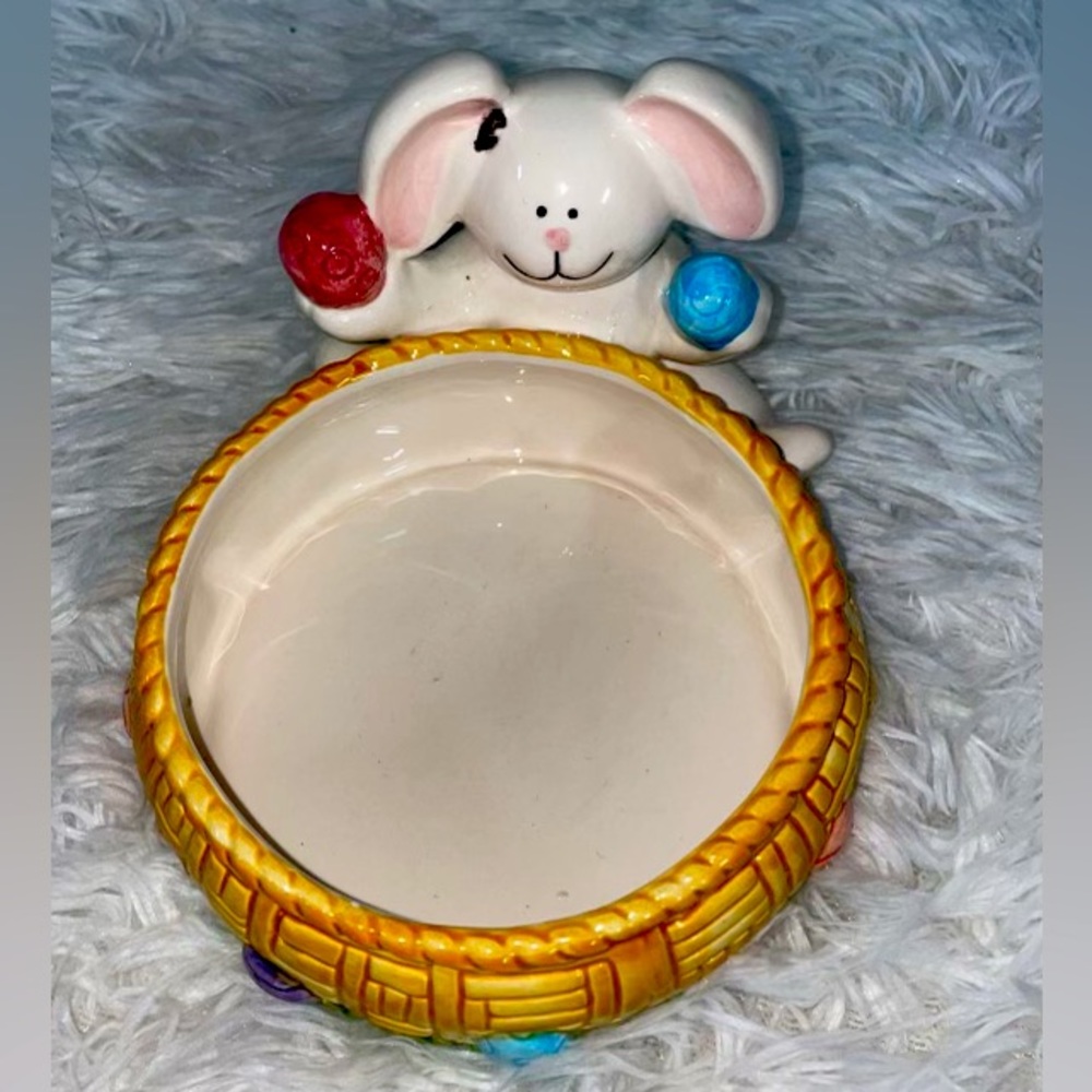 Cute ceramic bunny rabbit holding a basket